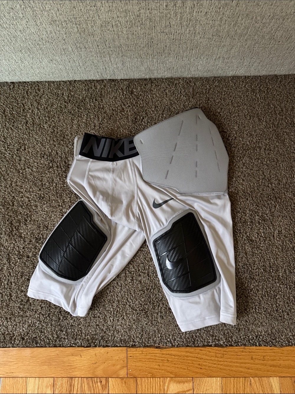 Nike White Men's Padded Football Compression Shorts with Black Knee Pads